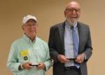 Steven Nelson and Bob Vogelbaugh with awards
